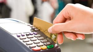 Credit card swipe - Credit and Debt Management Tips from the Pros